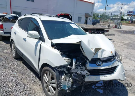2013 Hyundai Tucson Limited z USA, uszkodzony, nr VIN KM8JU3AC8DU588906